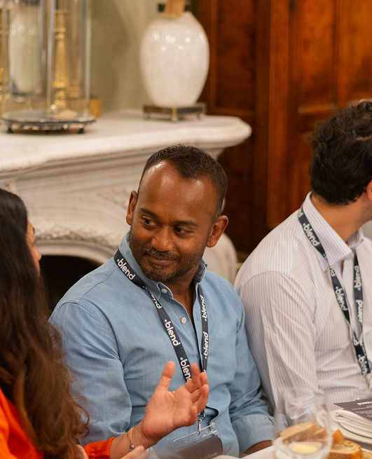 Conversation between peers at an executive event